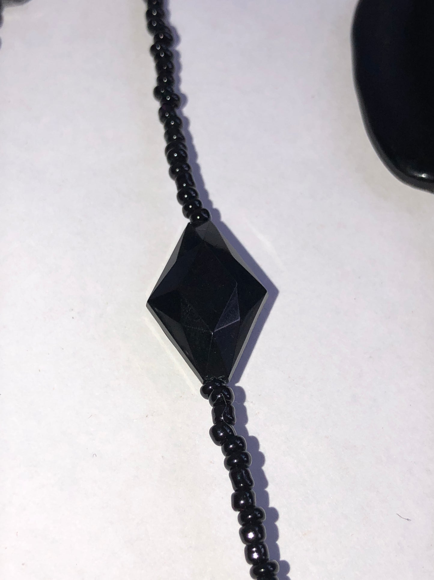 Long Black Seed Bead Necklace with Multi-Shape Glass Accents